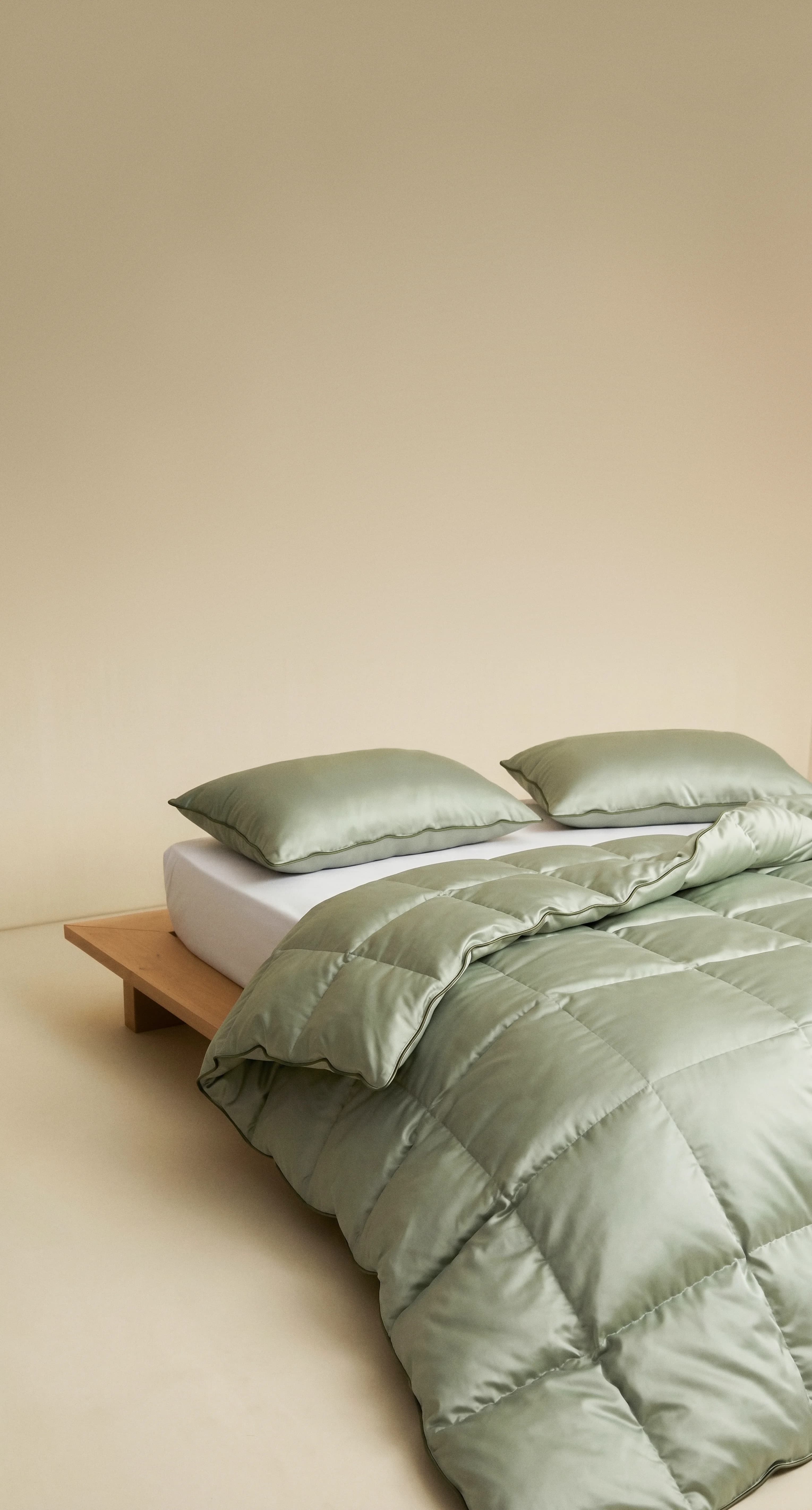 Eider down duvet on a bed